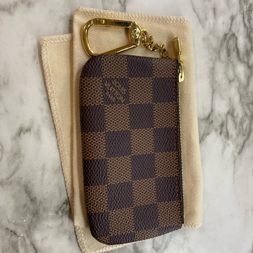 Louis Vuitton key pouch.